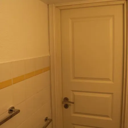 With1 Bedroom Separate Living With A Sofa Bed And A Tiny Kitchen A Bathroom Located In Nordstrand Near By The Sea For 3 Guests With A Garden And Grill 5 Extra Guests With Extra Cost In The With Sea View Just Outside The Apar Appartement *
