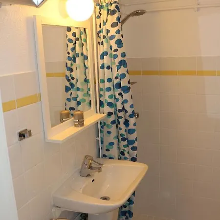 Lejlighed With1 Bedroom Separate Living With A Sofa Bed And A Tiny Kitchen A Bathroom Located In Nordstrand Near By The Sea For 3 Guests With A Garden And Grill 5 Extra Guests With Extra Cost In The With Sea View Just Outside The Apar