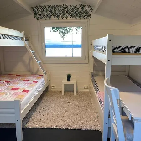 With1 Bedroom Separate Living With A Sofa Bed And A Tiny Kitchen A Bathroom Located In Nordstrand Near By The Sea For 3 Guests With A Garden And Grill 5 Extra Guests With Extra Cost In The With Sea View Just Outside The Apar Lejlighed Oslo